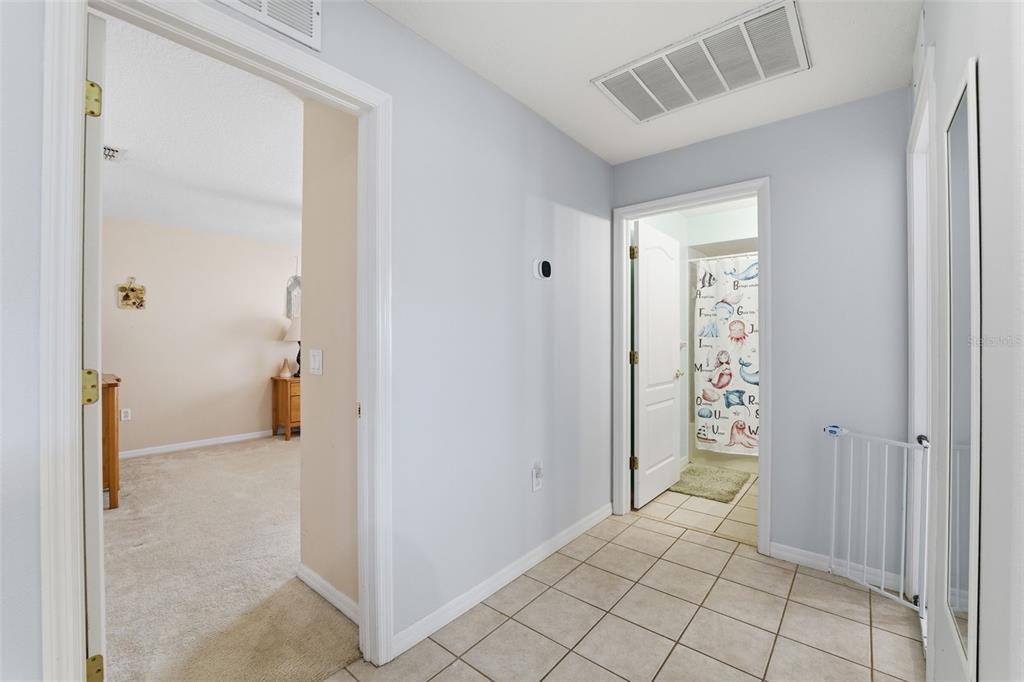 5220 Kirkwood Avenue Spring Hill, FL 34608 - Photo 23 of 67 a view of a room with white doors