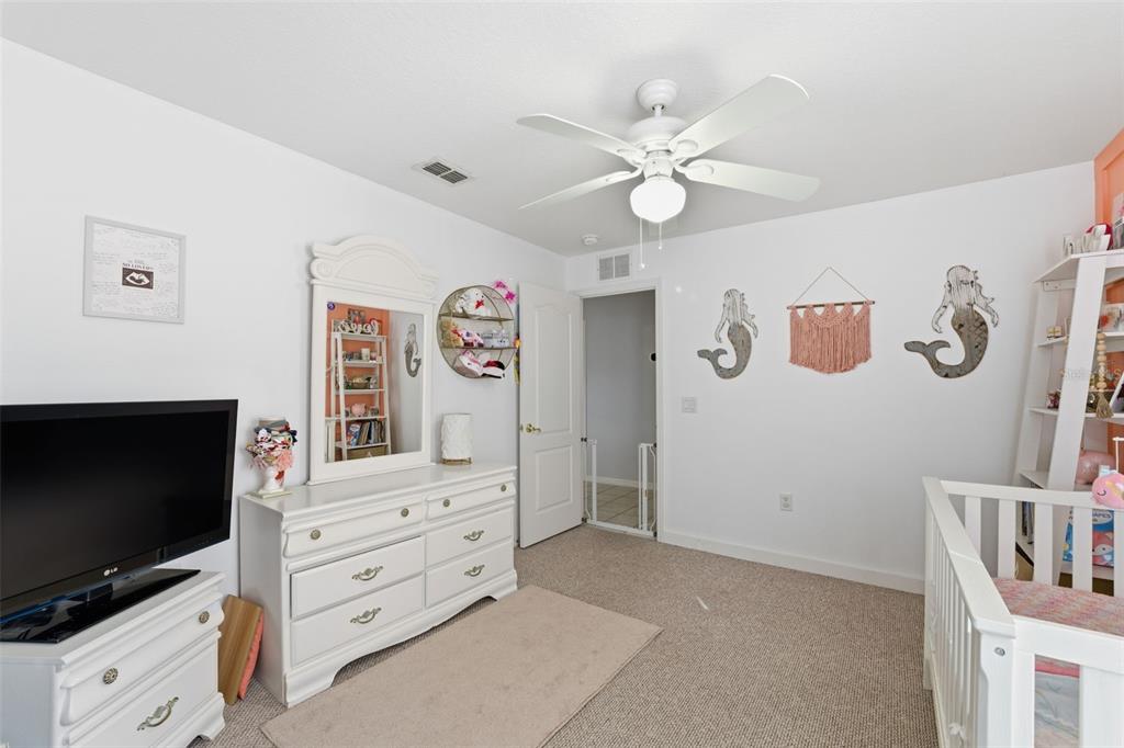 5220 Kirkwood Avenue Spring Hill, FL 34608 - Photo 29 of 67 a view of room with window and flat screen tv