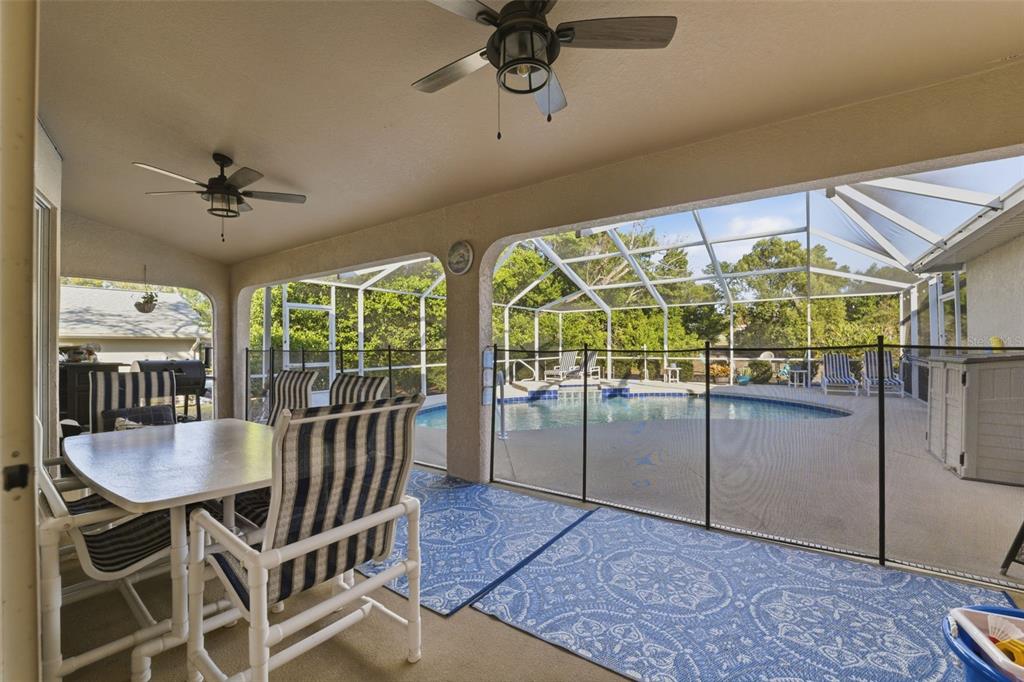 5220 Kirkwood Avenue Spring Hill, FL 34608 - Photo 35 of 67 a view of a dining room with furniture window and outside view