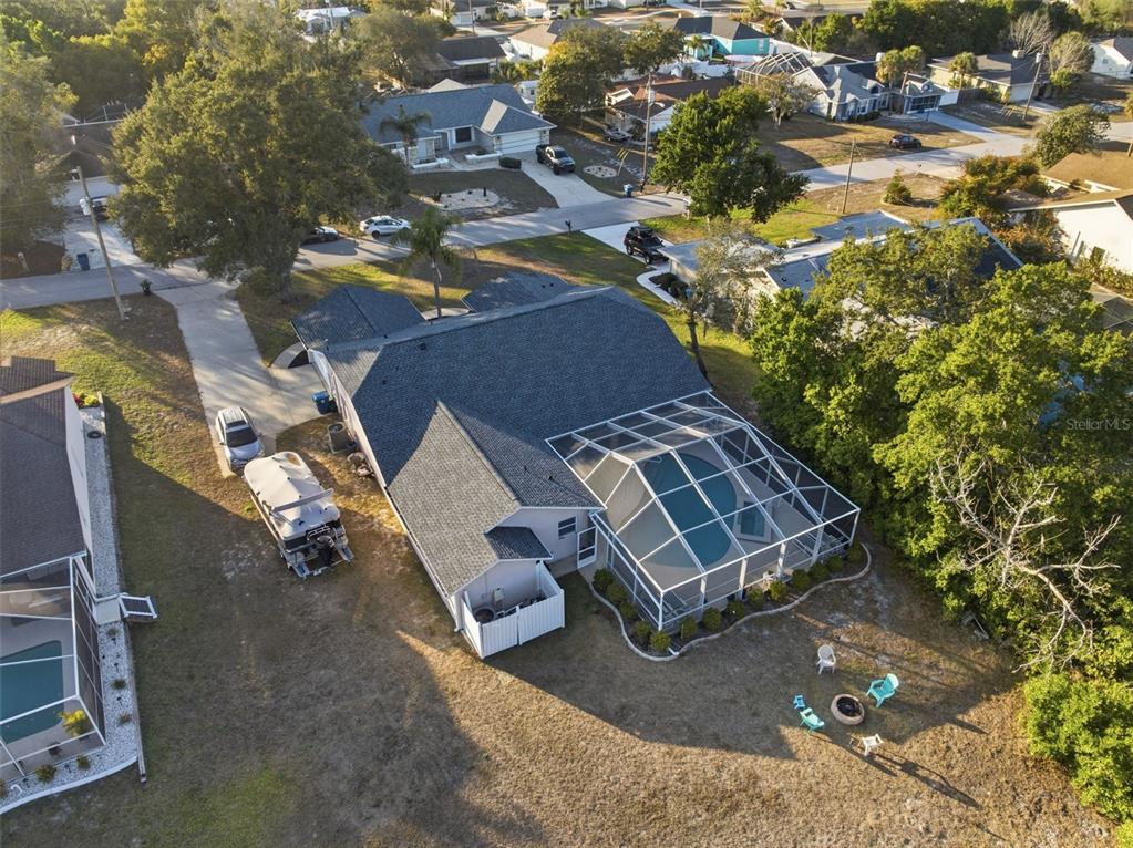 5220 Kirkwood Avenue Spring Hill, FL 34608 - Photo 51 of 67 an aerial view of a house with a yard and lake view