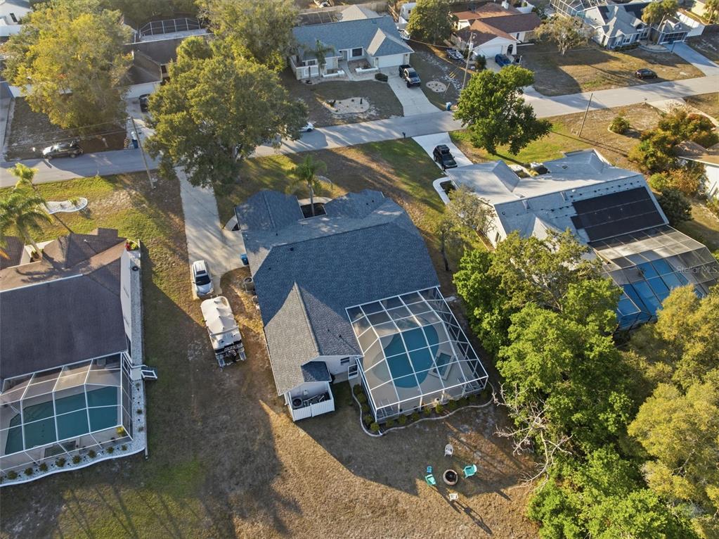 5220 Kirkwood Avenue Spring Hill, FL 34608 - Photo 53 of 67 an aerial view of a house with a yard