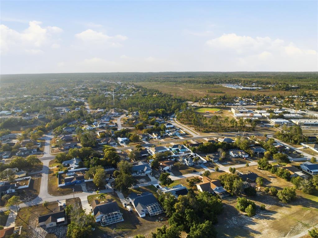 5220 Kirkwood Avenue Spring Hill, FL 34608 - Photo 56 of 67 an aerial view of multiple house