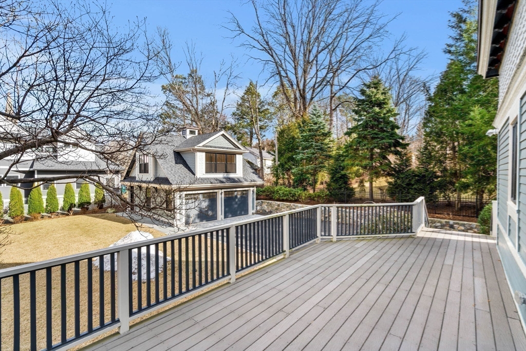 44 Putnam Street Newton, MA 02465 - Photo 30 of 38 a view of a house with a roof deck