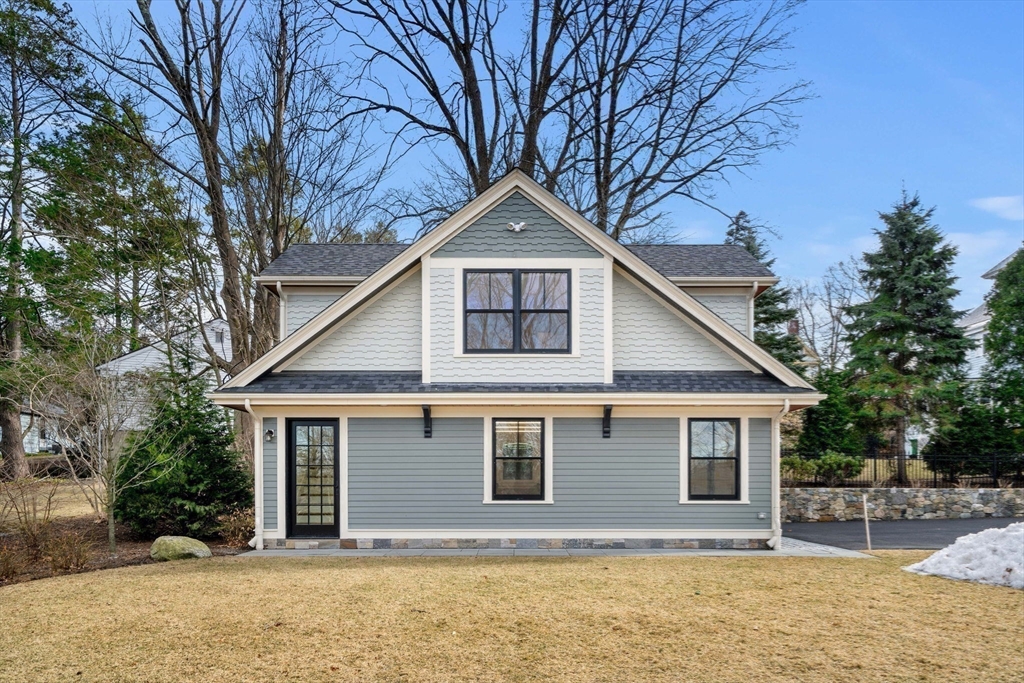 44 Putnam Street Newton, MA 02465 - Photo 33 of 38 a front view of a house with yard and trees