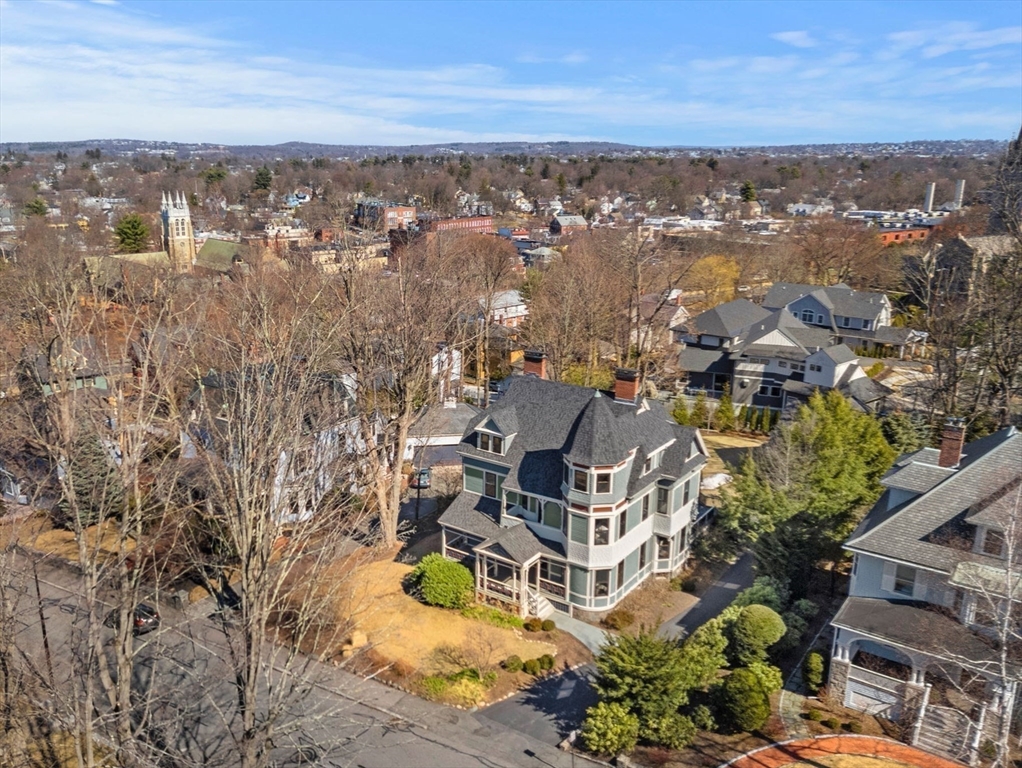 44 Putnam Street Newton, MA 02465 - Photo 37 of 38 an aerial view of residential building with outdoor space