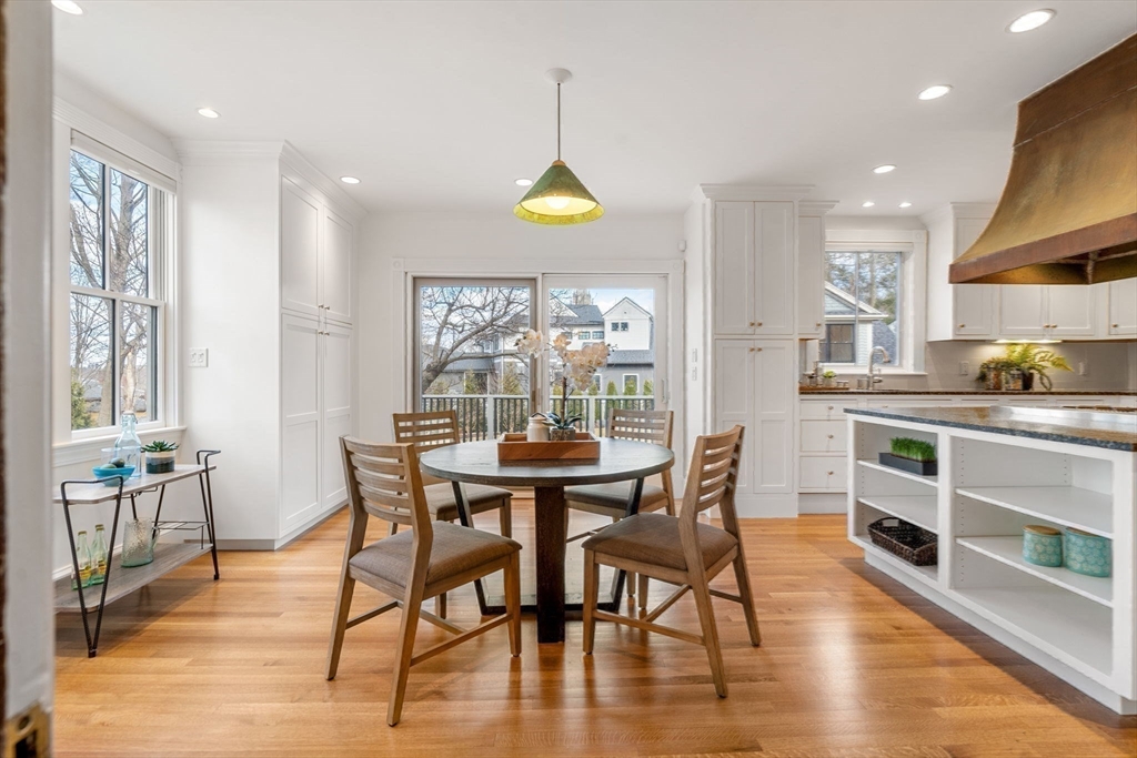 44 Putnam Street Newton, MA 02465 - Photo 10 of 38 a view of a dining room with furniture window and wooden floor