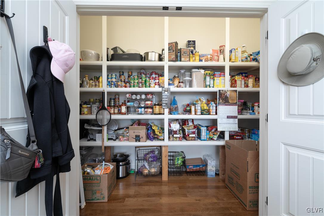 53 Airport Road Millville, PA 17846 - Photo 16 of 77 a view of a workspace with bookshelf and a window