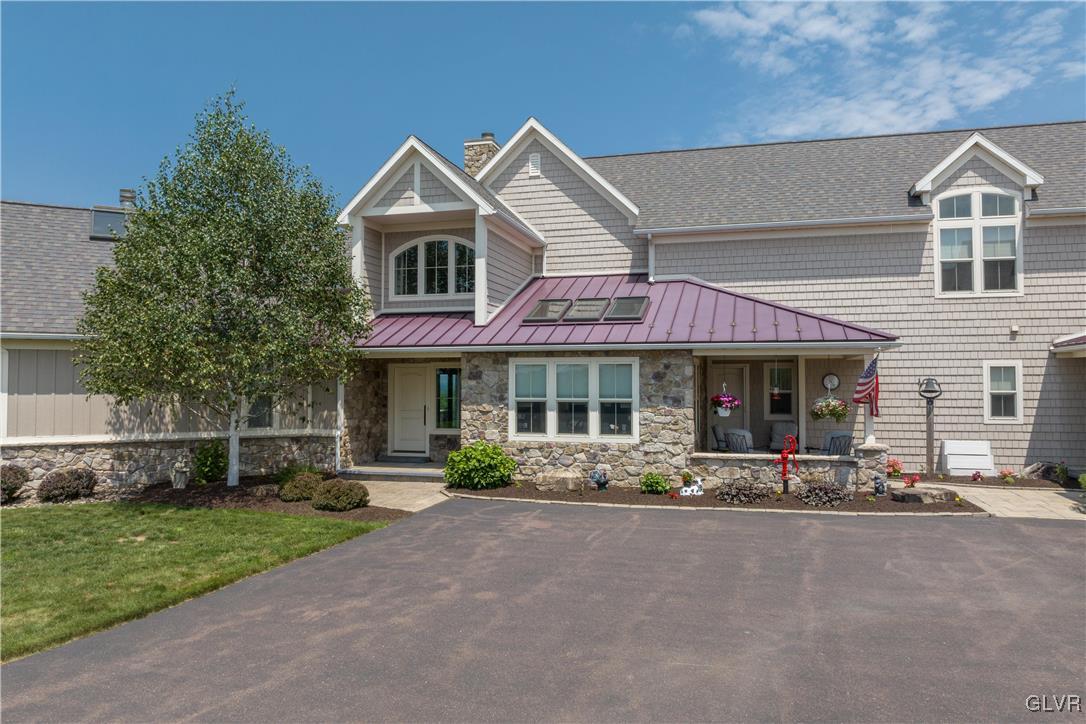53 Airport Road Millville, PA 17846 - Photo 43 of 77 a front view of a house with garden