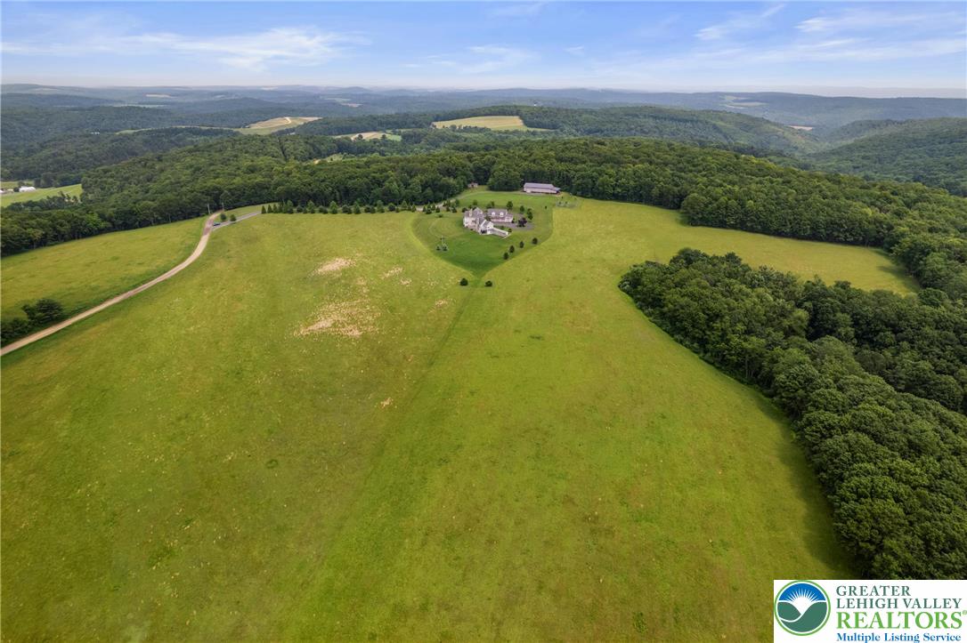 53 Airport Road Millville, PA 17846 - Photo 70 of 77 a view of a lake with a city