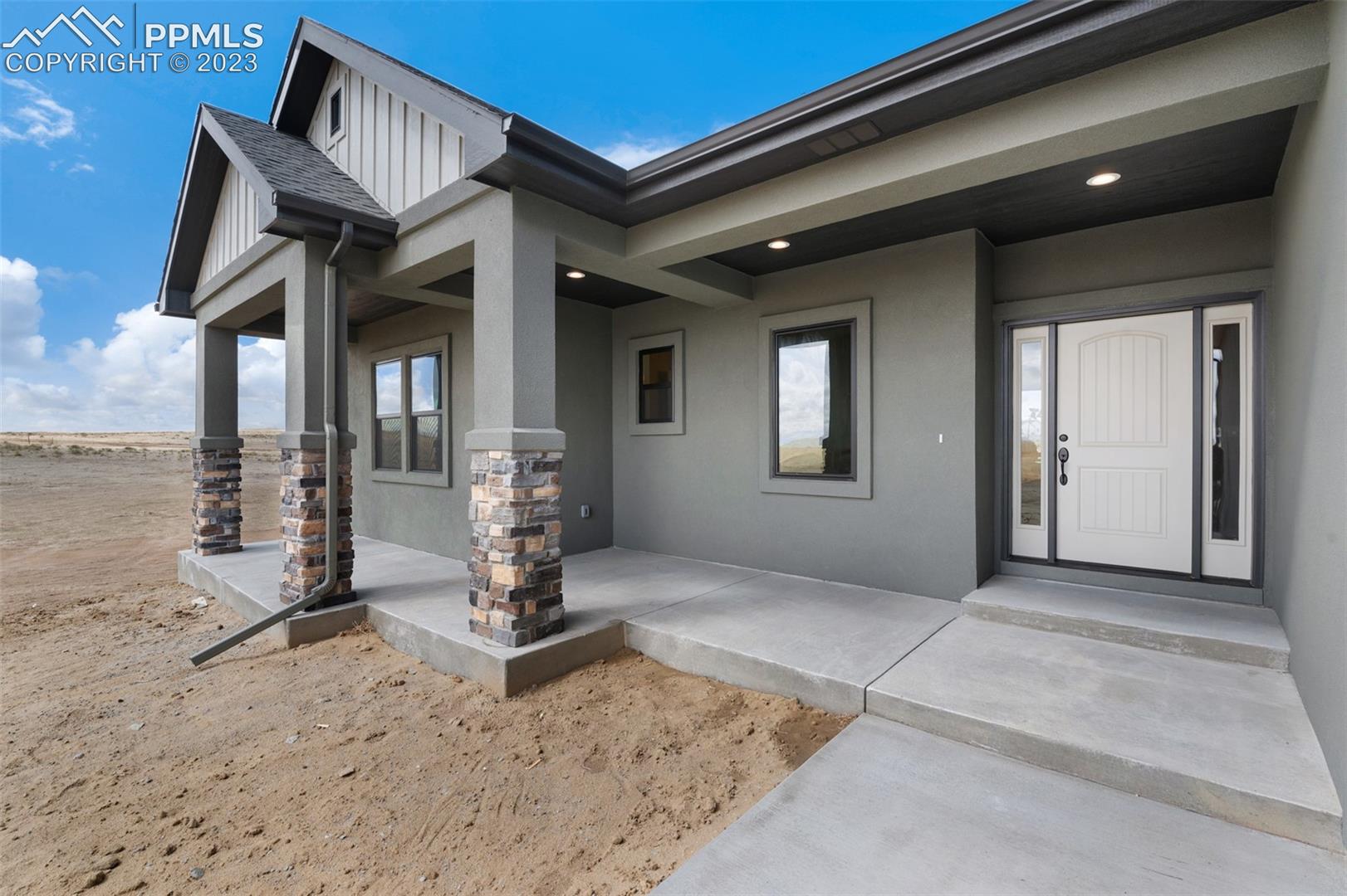2970 Hoofprint Road Peyton, CO 80831 - Photo 40 of 42 Front Covered Porch To View Morning Sun Rises