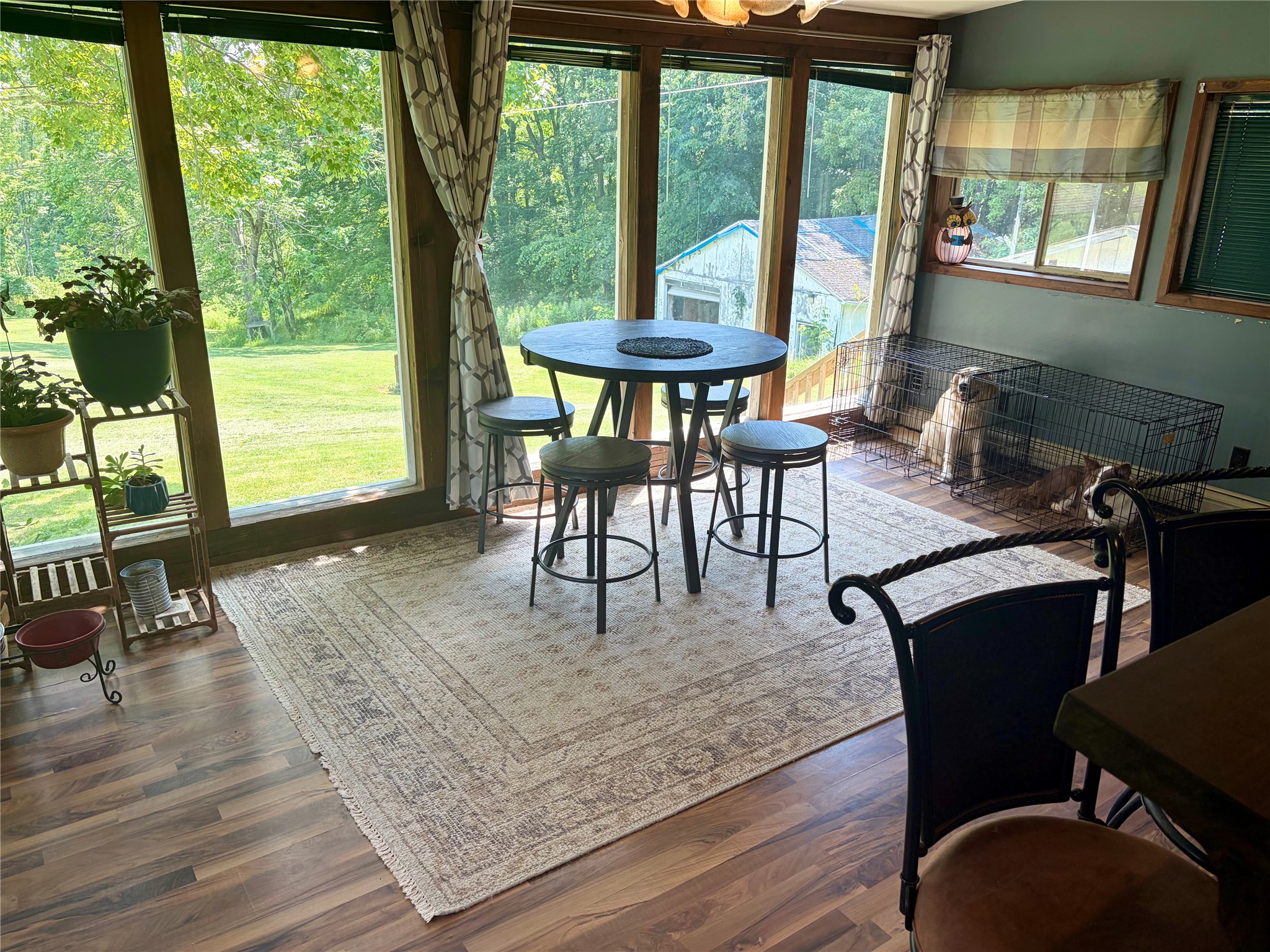 1490 Carlton Road Carlton, PA 16311 - Photo 26 of 44 dining room overlooking back yard