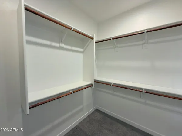 a view of an empty walk in closet