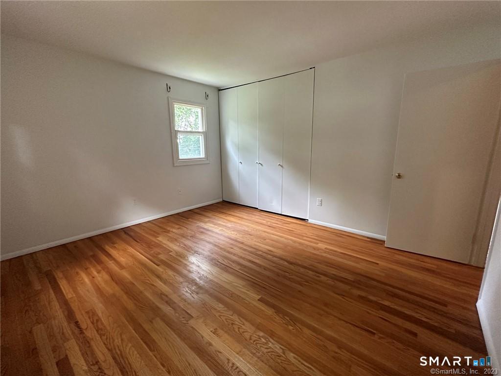 112 Rodgers Road, Unit 112 Fairfield, CT 06824 - Photo 17 of 22 Bedroom 1