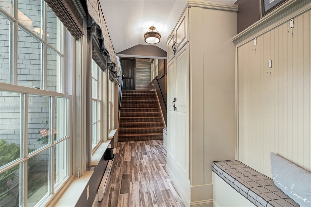 10 Cherry Street Fairhaven, MA 02719 - Photo 20 of 38 a view of a balcony with wooden floor and stairs