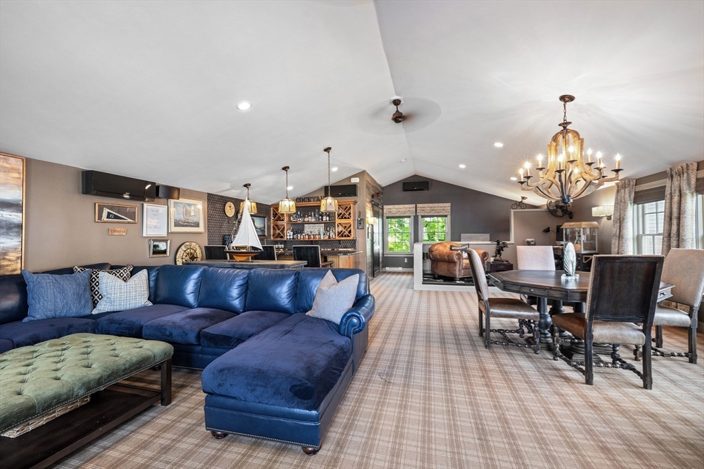 10 Cherry Street Fairhaven, MA 02719 - Photo 22 of 38 a living room with furniture and a chandelier
