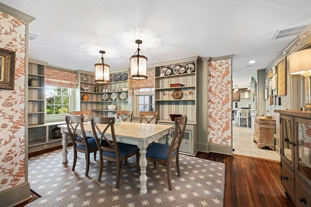 10 Cherry Street Fairhaven, MA 02719 - Photo 6 of 38 a view of a dining room with furniture and wooden floor