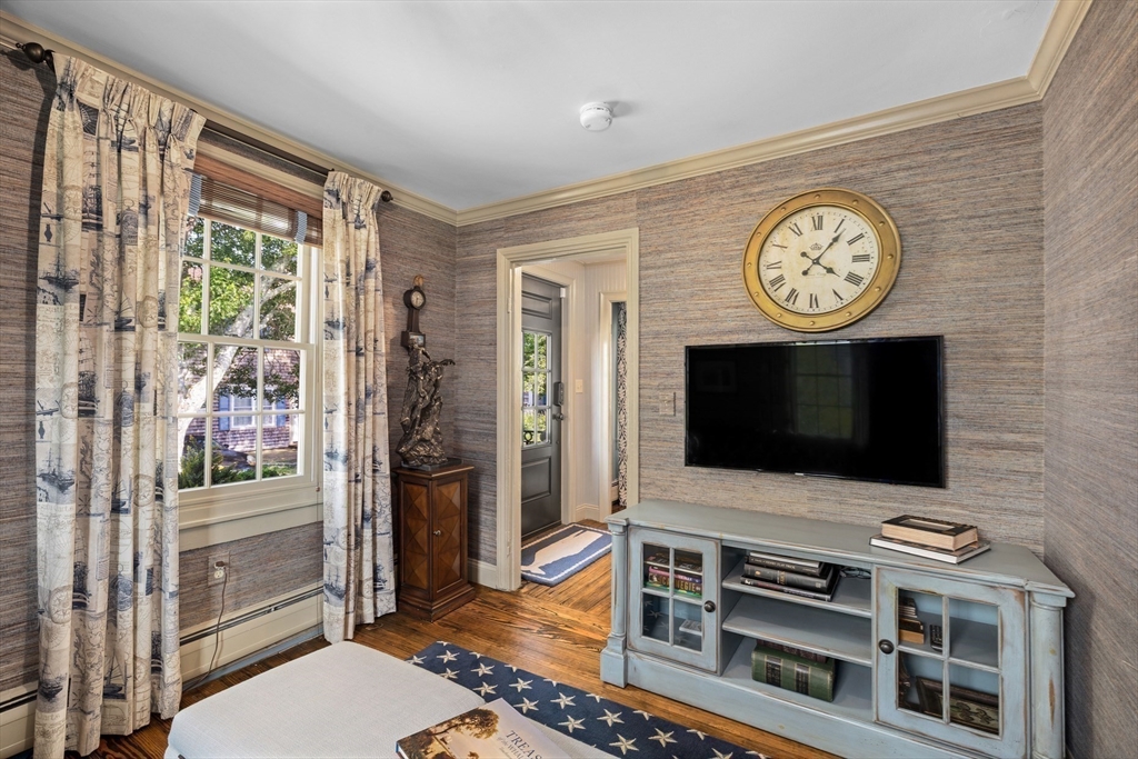 10 Cherry Street Fairhaven, MA 02719 - Photo 10 of 38 a living room with a flat screen tv and a large window