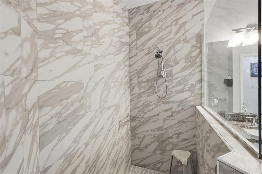 205 Merlot Street DeLand, FL 32724 - Photo 19 of 34 a bathroom with a bathtub and shower