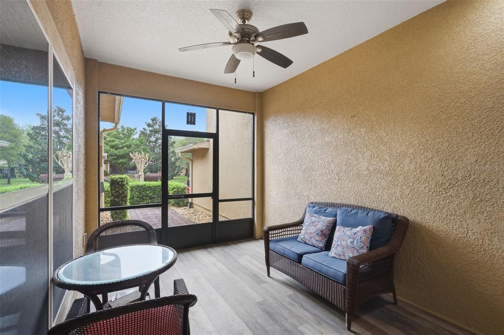 205 Merlot Street DeLand, FL 32724 - Photo 2 of 34 a living room with furniture and a large window