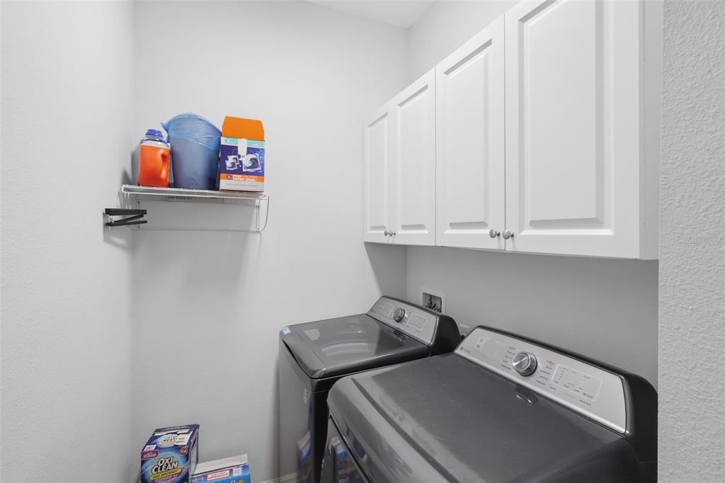 205 Merlot Street DeLand, FL 32724 - Photo 23 of 34 a utility room with dryer and washer