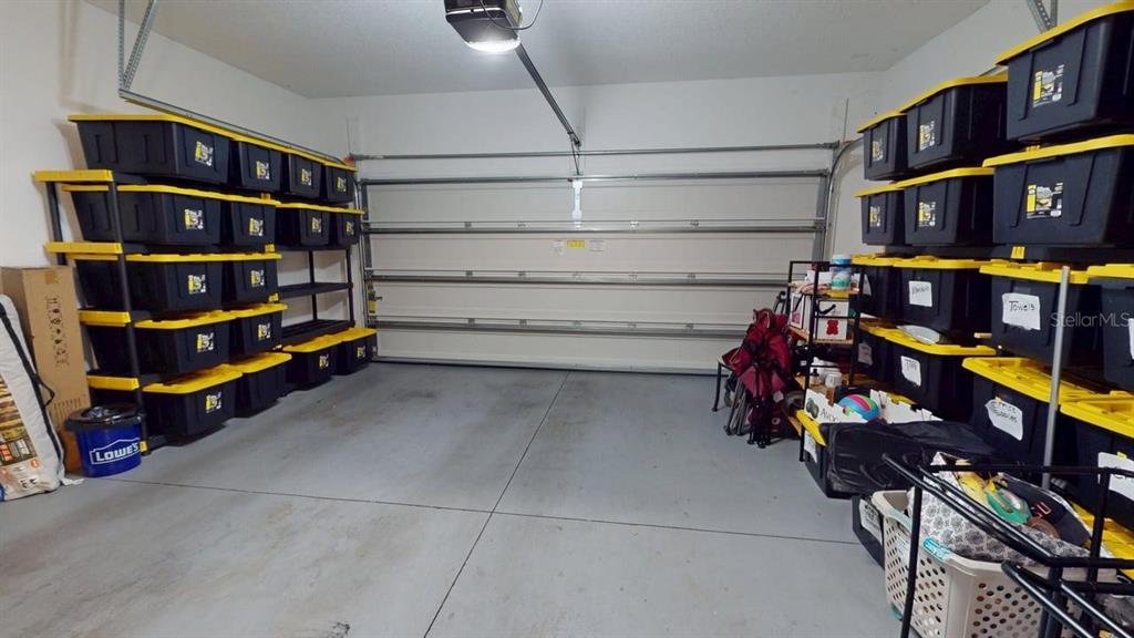 205 Merlot Street DeLand, FL 32724 - Photo 25 of 34 a view of store room with racks