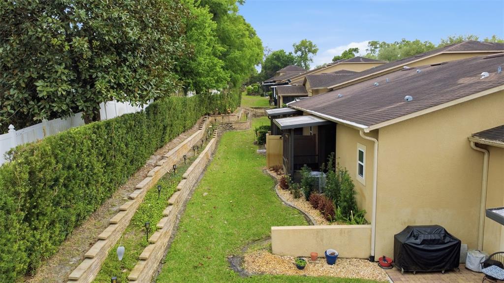 205 Merlot Street DeLand, FL 32724 - Photo 26 of 34 a view of a house with a yard
