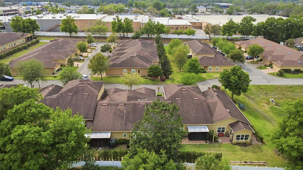 205 Merlot Street DeLand, FL 32724 - Photo 28 of 34 an aerial view of multiple houses with yard