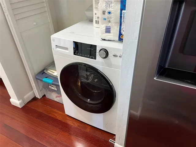 a bedroom with a bed and dresser