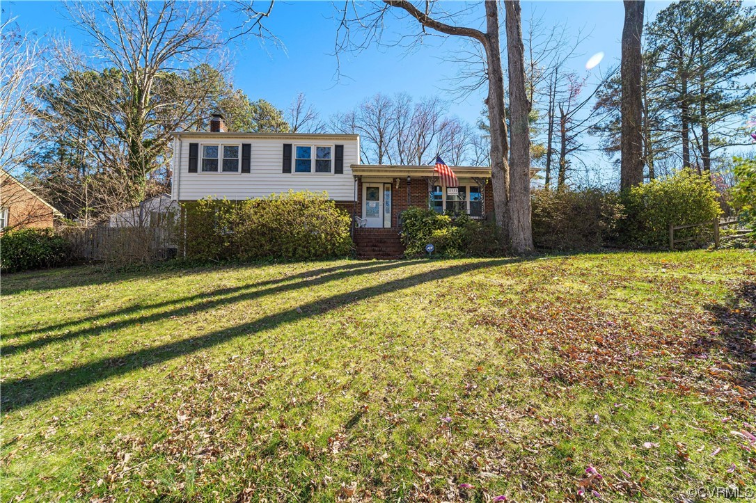 11533 Rolling Brook Road Chester, VA 23831 - Photo 1 of 30 a front view of a house with a yard