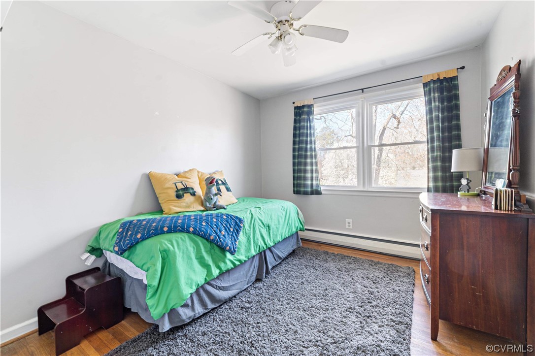 11533 Rolling Brook Road Chester, VA 23831 - Photo 18 of 30 a bedroom with a bed and window