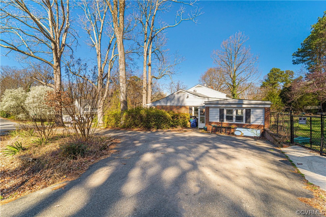 11533 Rolling Brook Road Chester, VA 23831 - Photo 29 of 30 a view of a house with backyard and sitting area