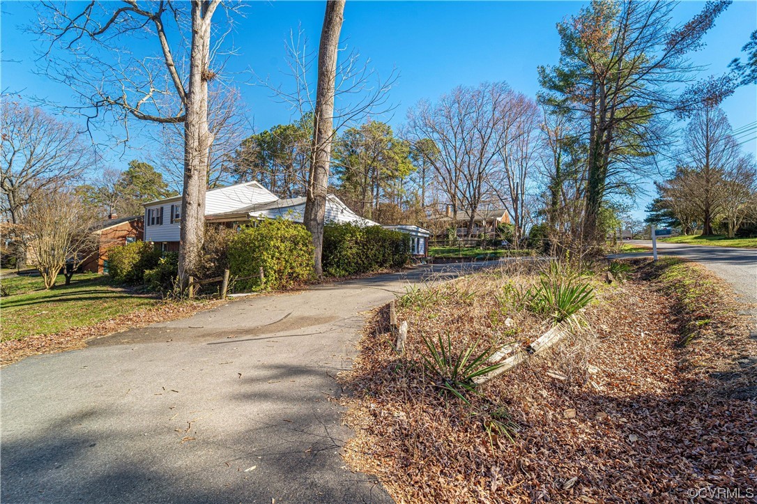 11533 Rolling Brook Road Chester, VA 23831 - Photo 30 of 30 a view of a yard with plants on it