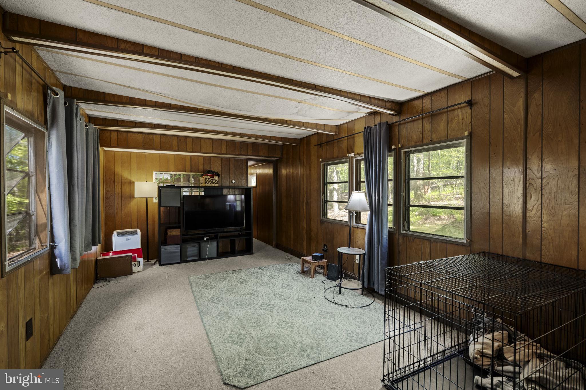 1528 Hilltop Road Mohnton, PA 19540 - Photo 13 of 19 a living room with furniture and a flat screen tv