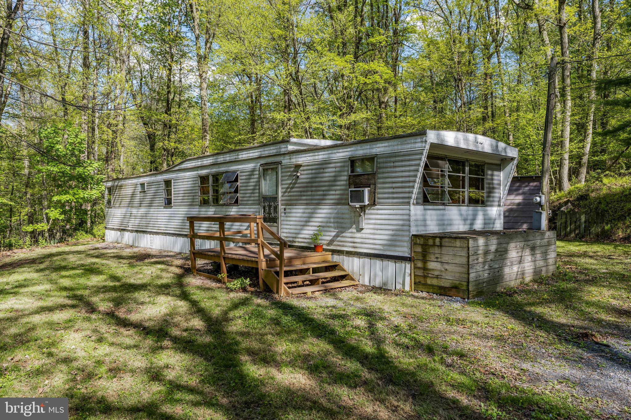 1528 Hilltop Road Mohnton, PA 19540 - Photo 2 of 19 a view of a house with backyard and sitting area