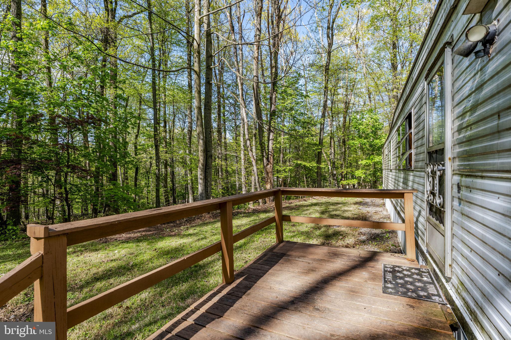 1528 Hilltop Road Mohnton, PA 19540 - Photo 3 of 19 a view of balcony with wooden floor and fence