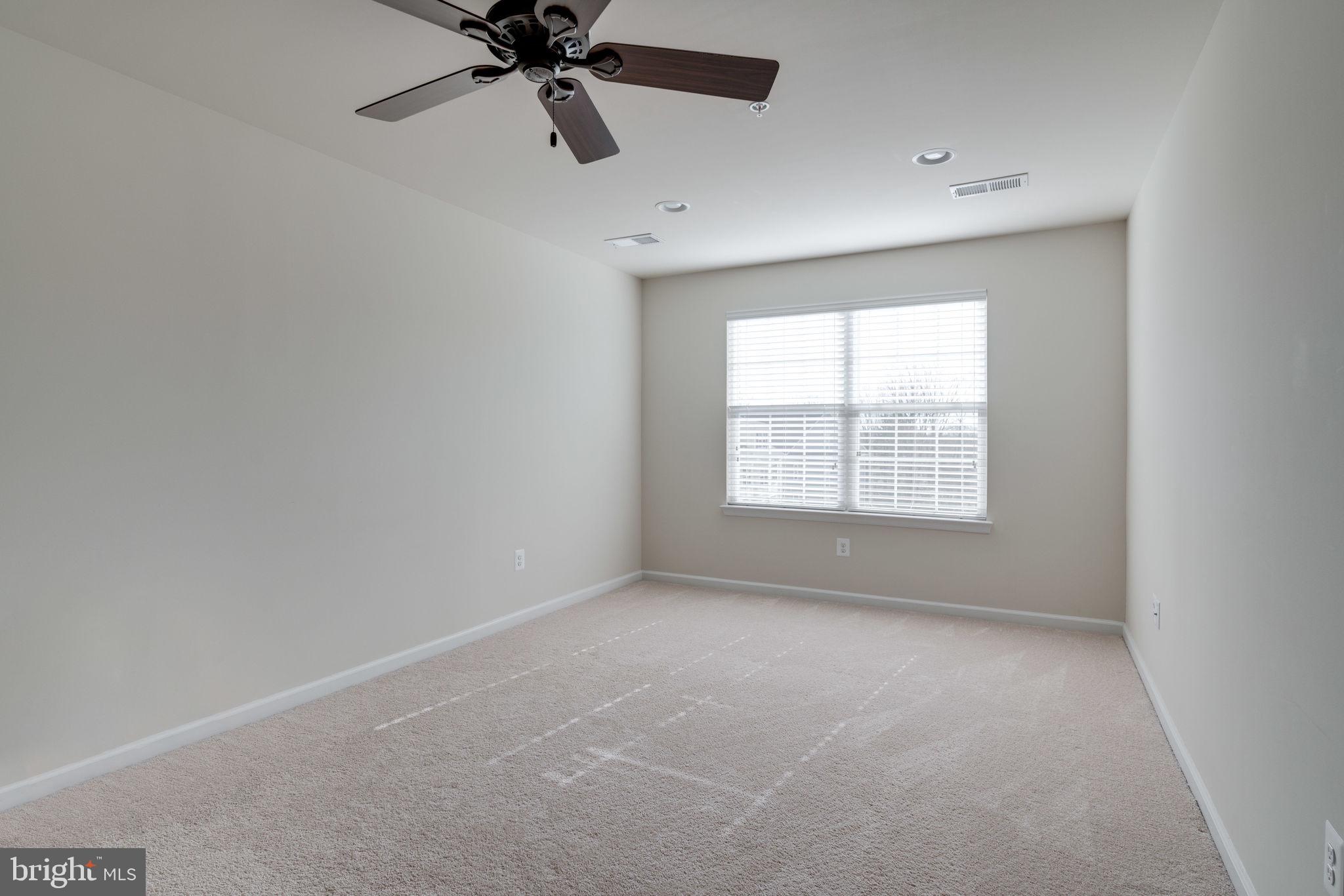 4740 Dane Ridge Circle, Unit 20 Woodbridge, VA 22193 - Photo 37 of 42 Upper level bedroom with walk-in closets