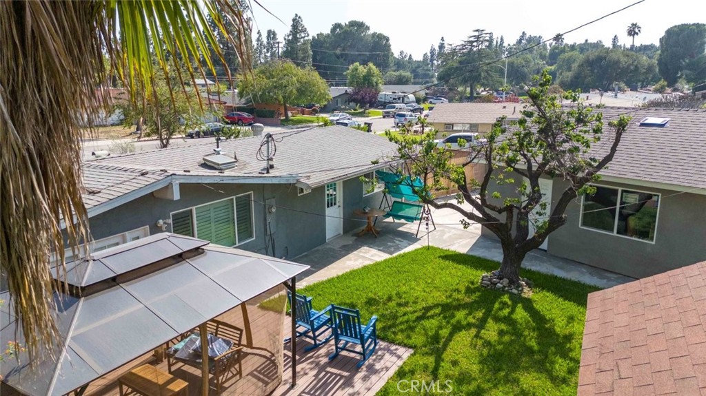 301 West Ashby Street Azusa, CA 91702 - Photo 19 of 75 a view of a house with a yard