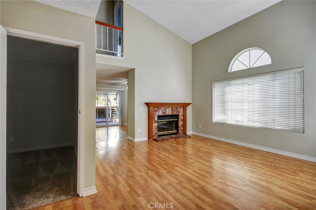 11024 Charleston Street Rancho Cucamonga, CA 91701 - Photo 19 of 30 wooden floor in an empty room with a window