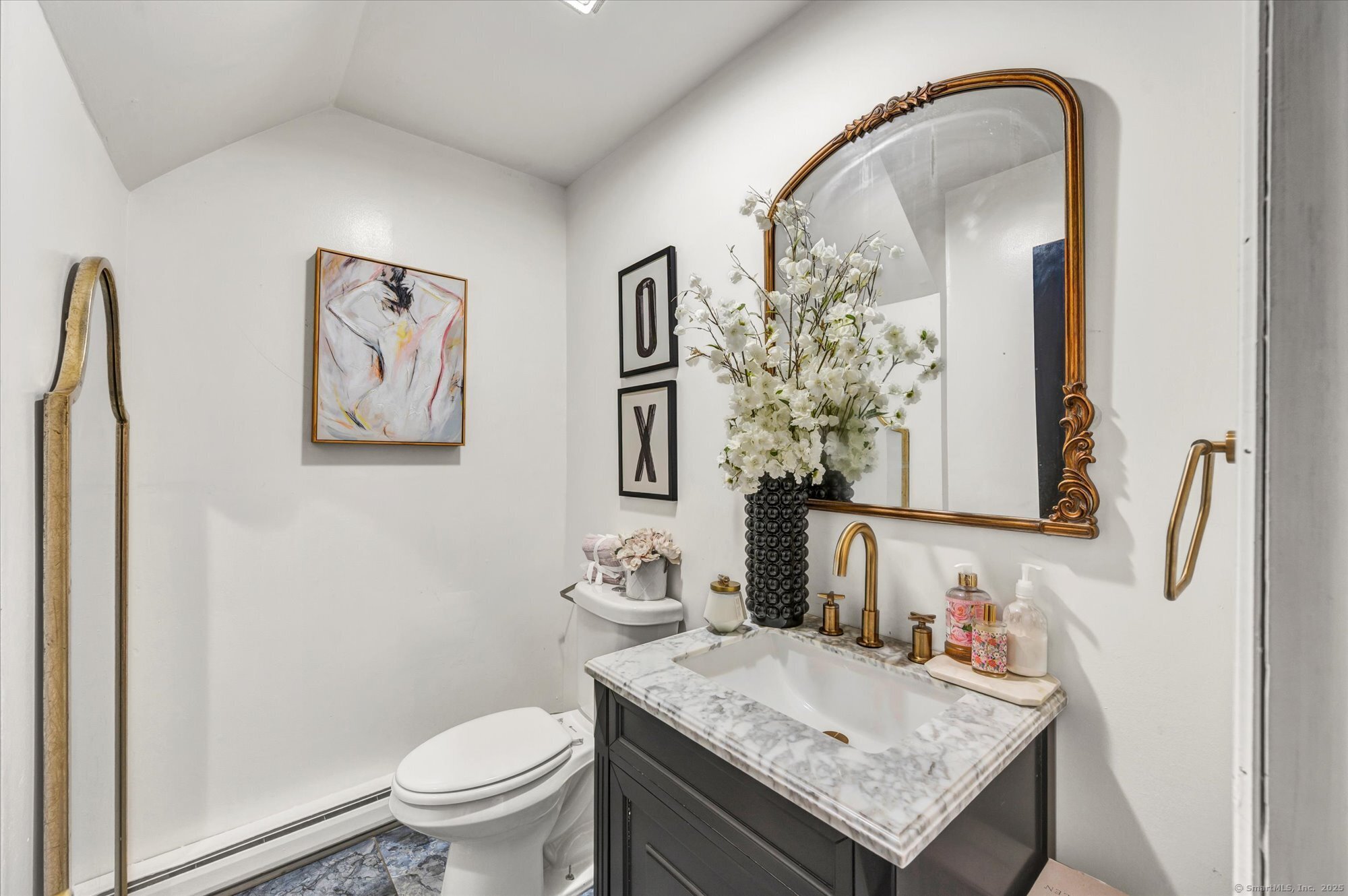 9 Katrina Circle Bethel, CT 06801 - Photo 18 of 25 a bathroom with a granite countertop toilet sink and mirror