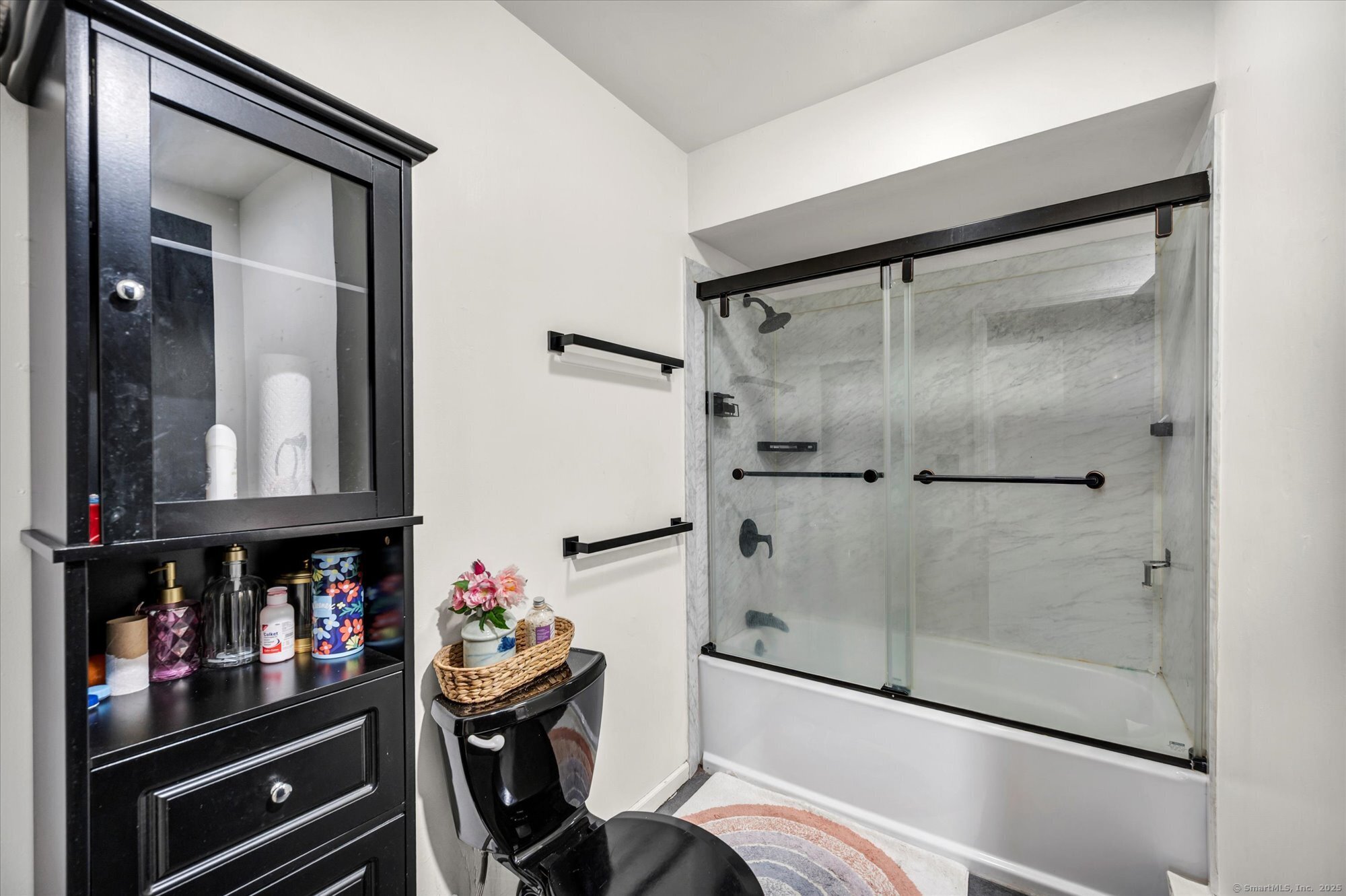 9 Katrina Circle Bethel, CT 06801 - Photo 19 of 25 a room that has a lot of books