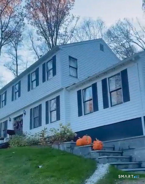 9 Katrina Circle Bethel, CT 06801 - Photo 24 of 25 front view of house with a yard