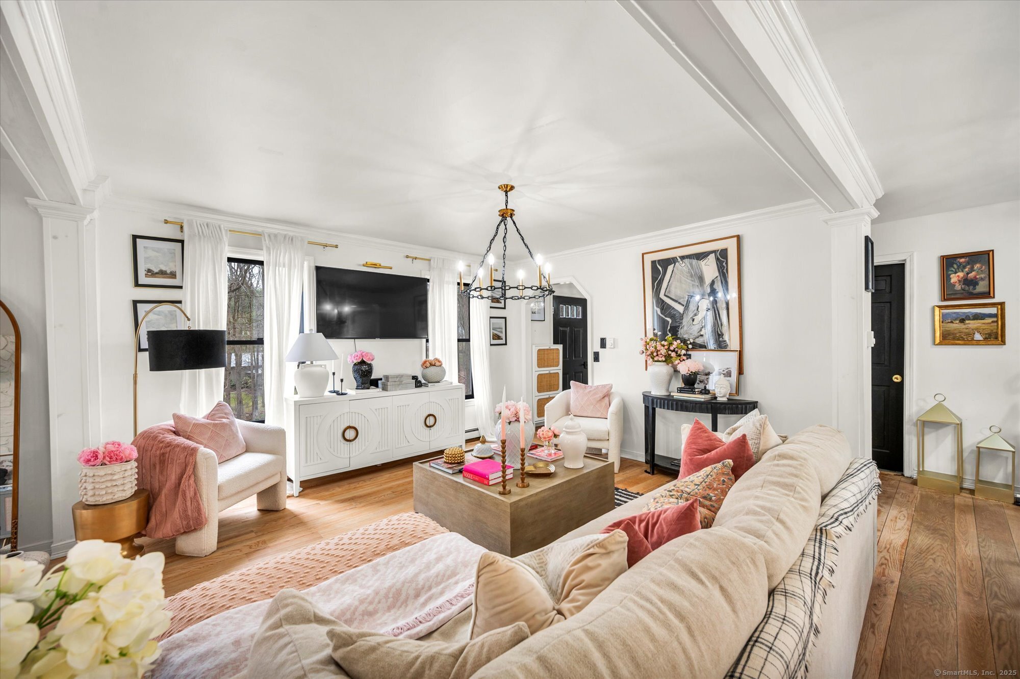 9 Katrina Circle Bethel, CT 06801 - Photo 6 of 25 a living room with furniture and a flat screen tv