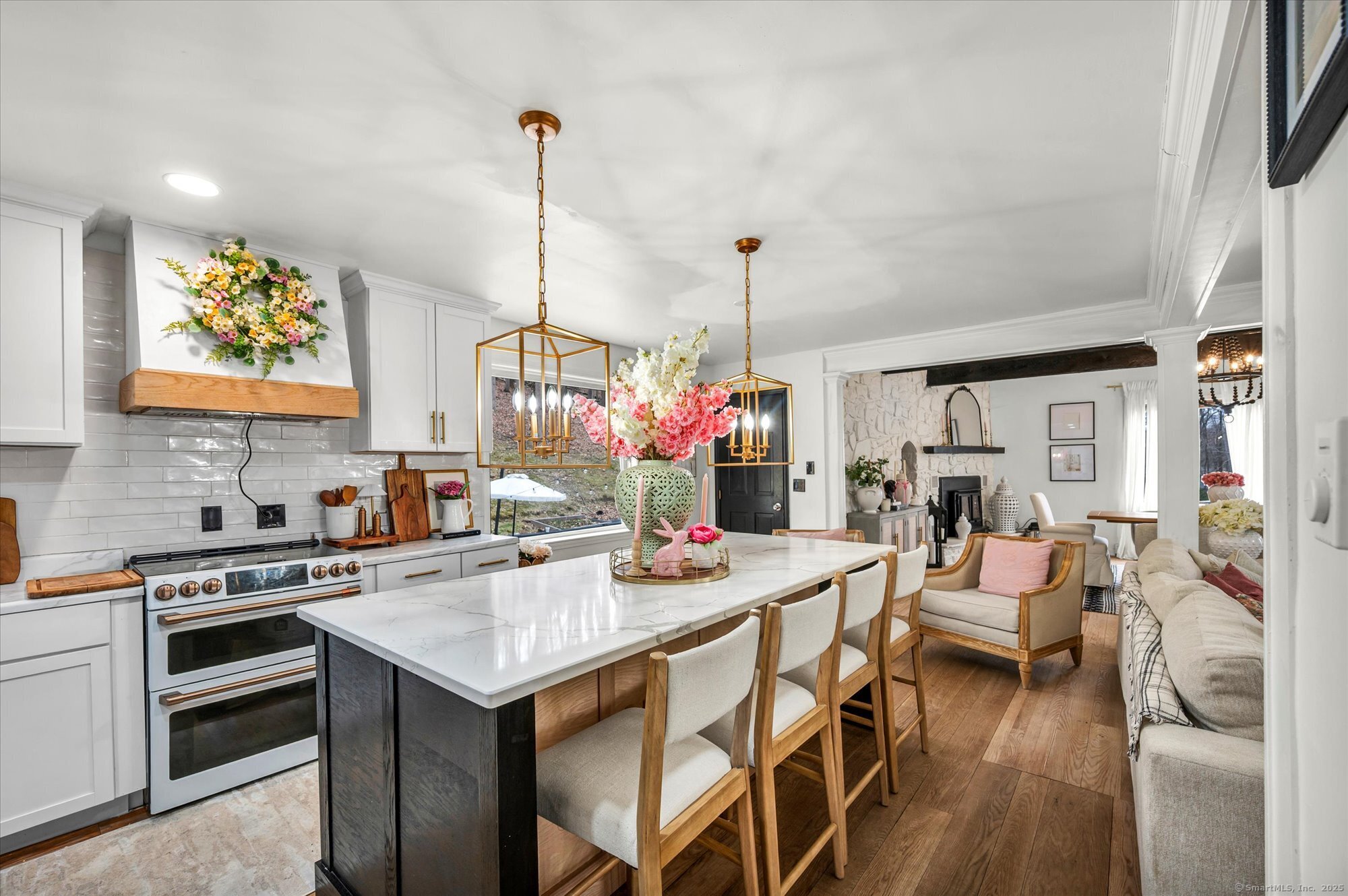 9 Katrina Circle Bethel, CT 06801 - Photo 9 of 25 a table and chairs in a kitchen next to a window