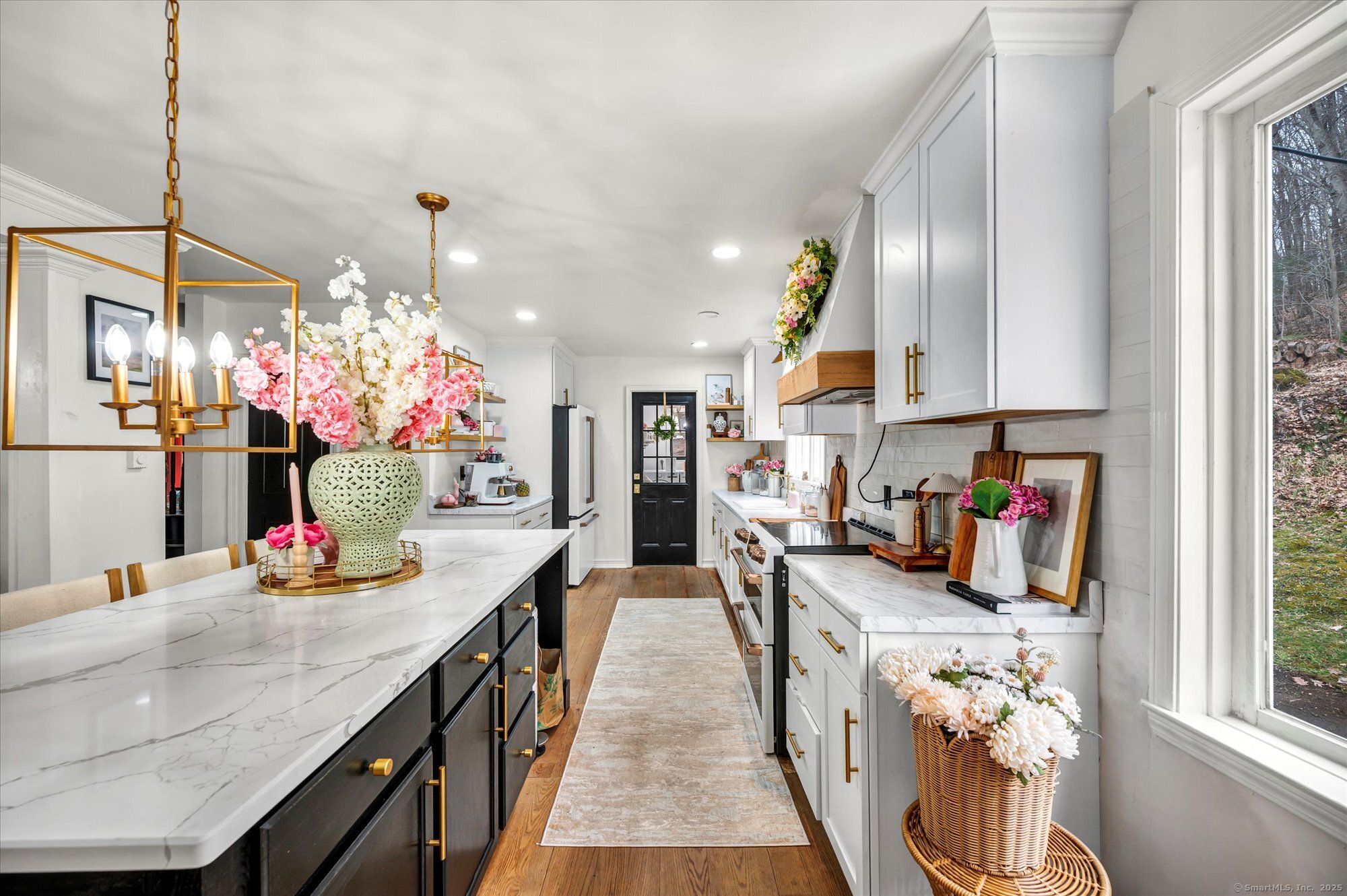 9 Katrina Circle Bethel, CT 06801 - Photo 10 of 25 a kitchen view of counter top space a sink and living room view