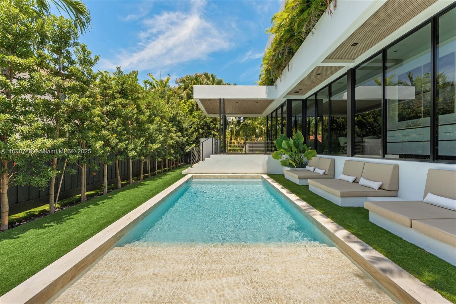 650 Warren Lane Key Biscayne, FL 33149 - Photo 11 of 34 a view of swimming pool with a patio