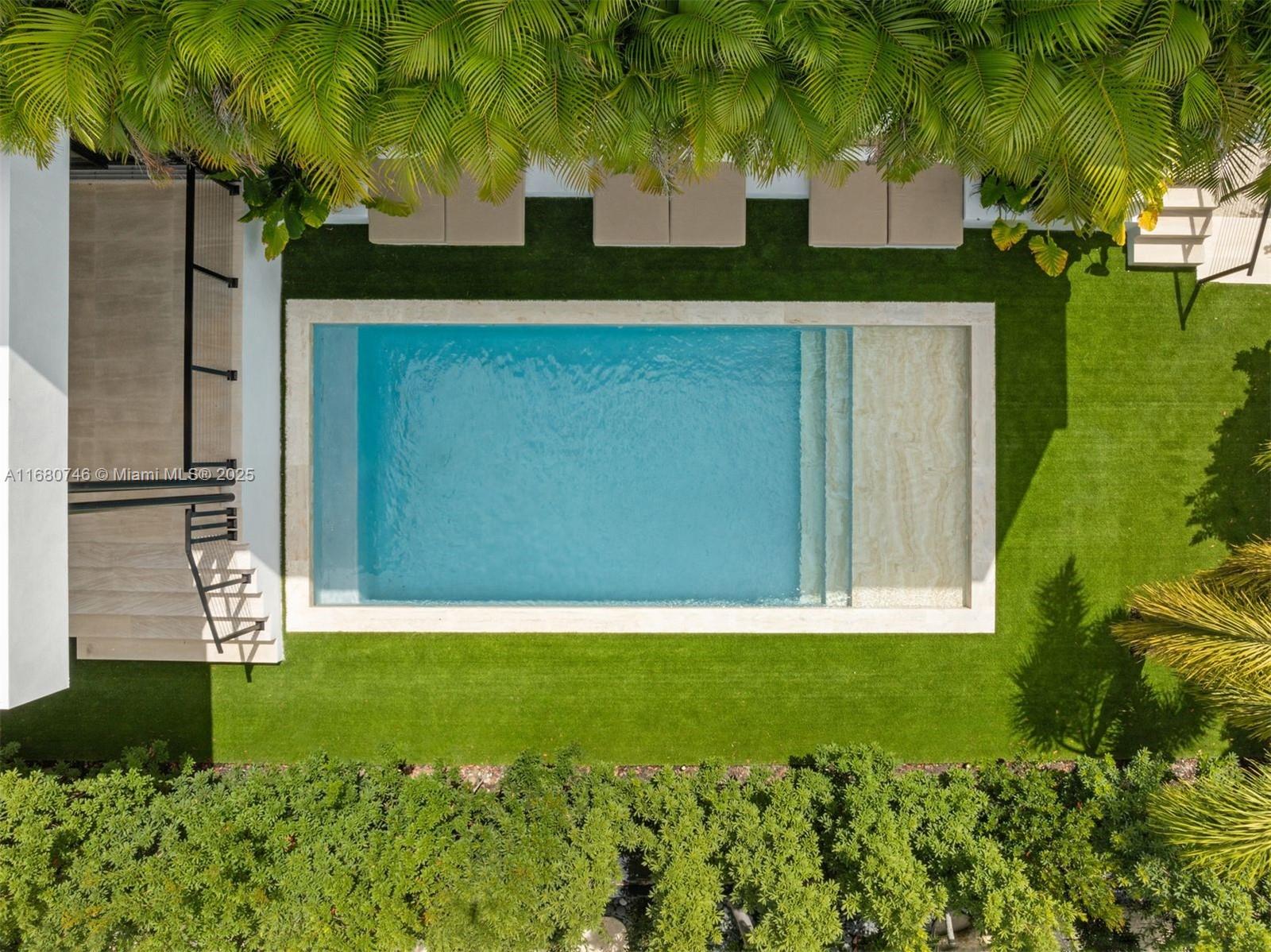 650 Warren Lane Key Biscayne, FL 33149 - Photo 12 of 34 a view of a backyard