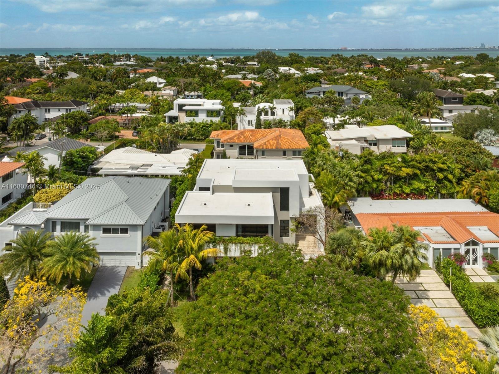 650 Warren Lane Key Biscayne, FL 33149 - Photo 13 of 34 an aerial view of residential houses with outdoor space