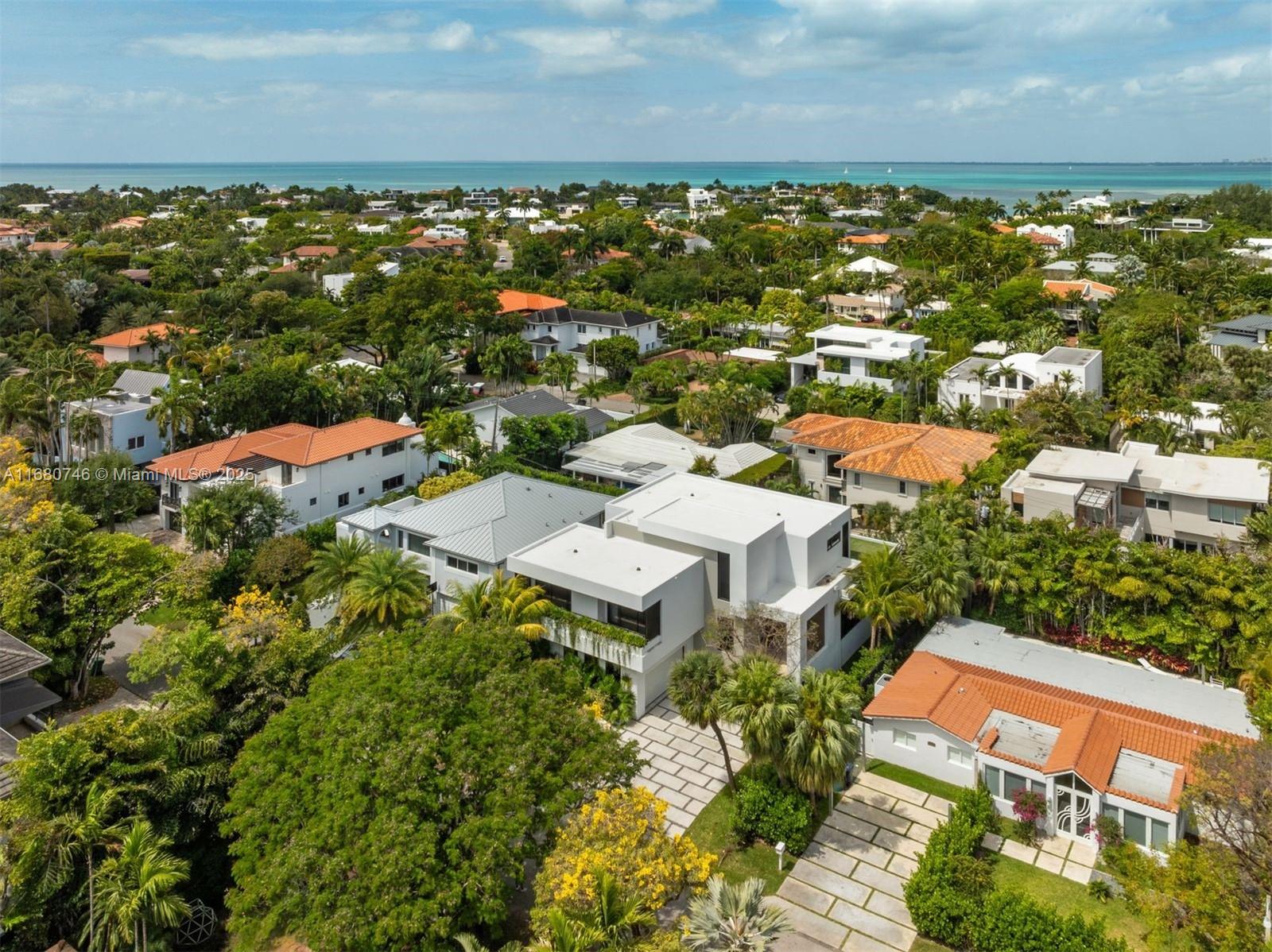 650 Warren Lane Key Biscayne, FL 33149 - Photo 14 of 34 an aerial view of residential houses with outdoor space and trees