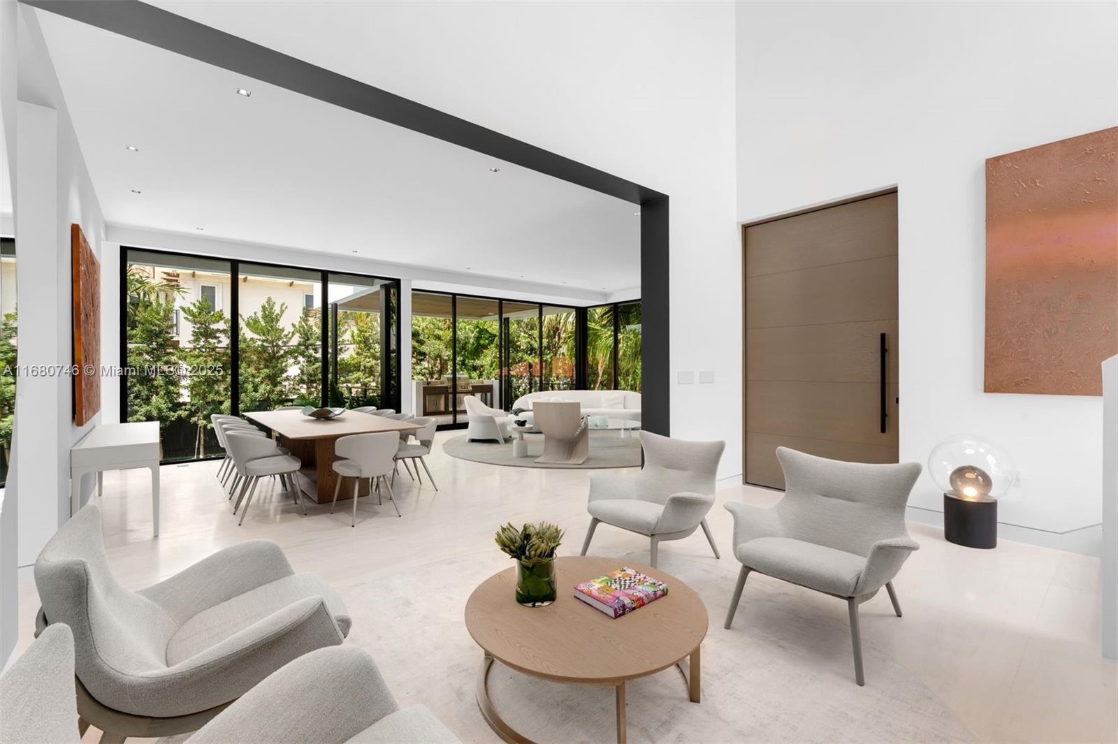 650 Warren Lane Key Biscayne, FL 33149 - Photo 15 of 34 a living room with furniture and a large window