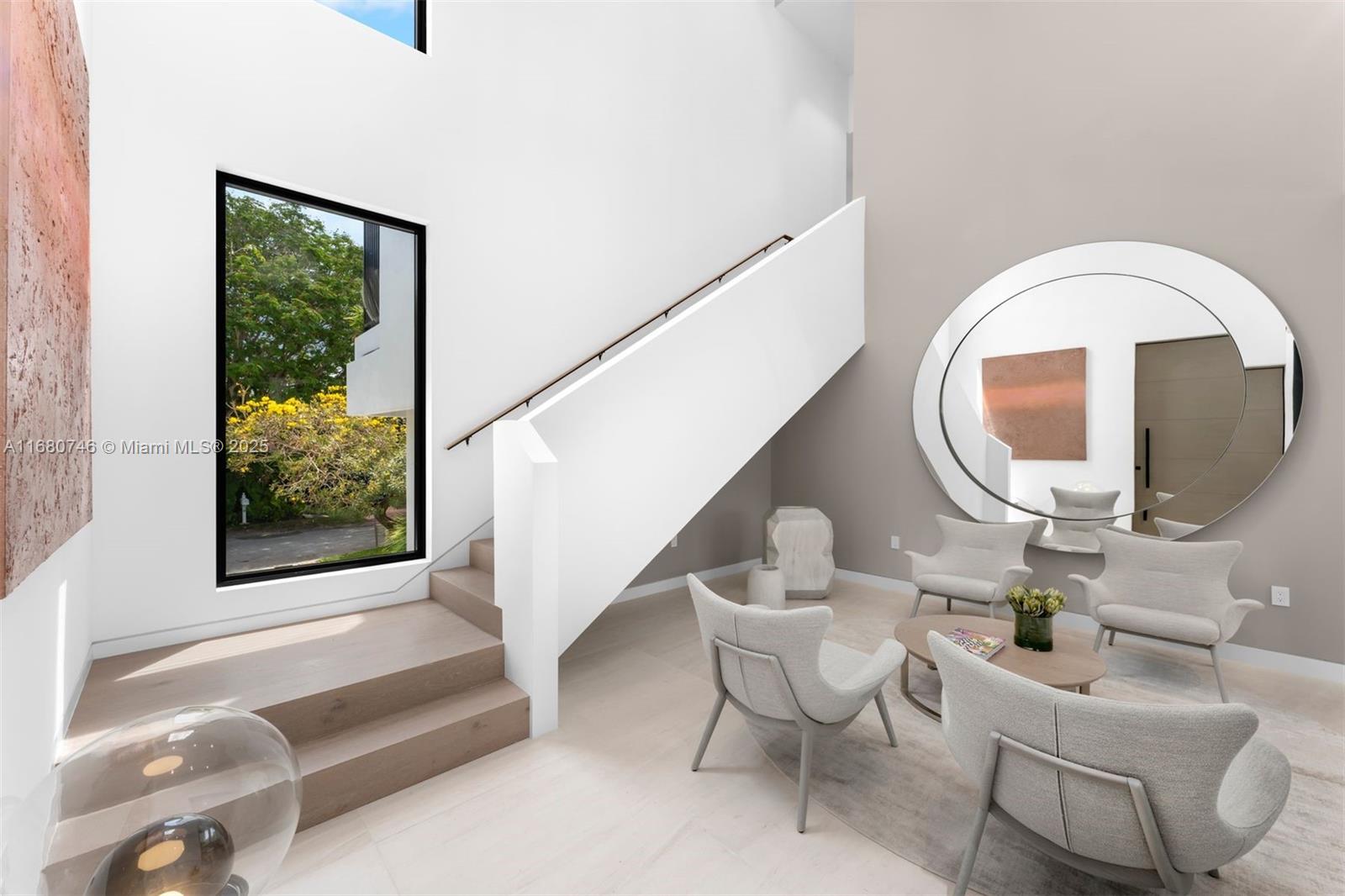 650 Warren Lane Key Biscayne, FL 33149 - Photo 17 of 34 a living room with furniture and a large window